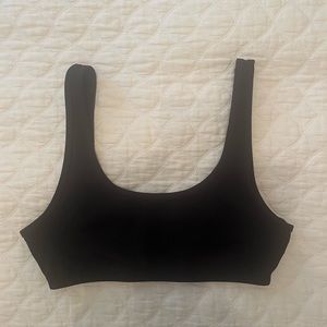 TNA Sports bra in black, size M.